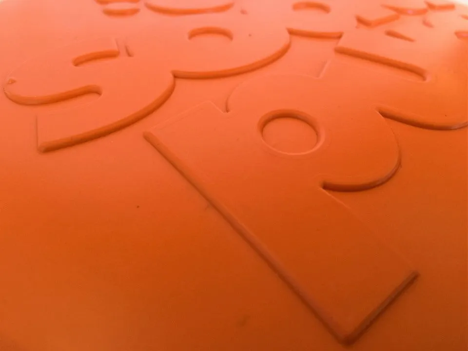 Bottle Top Flyer Durable Rubber Retrieving Frisbee - Orange
